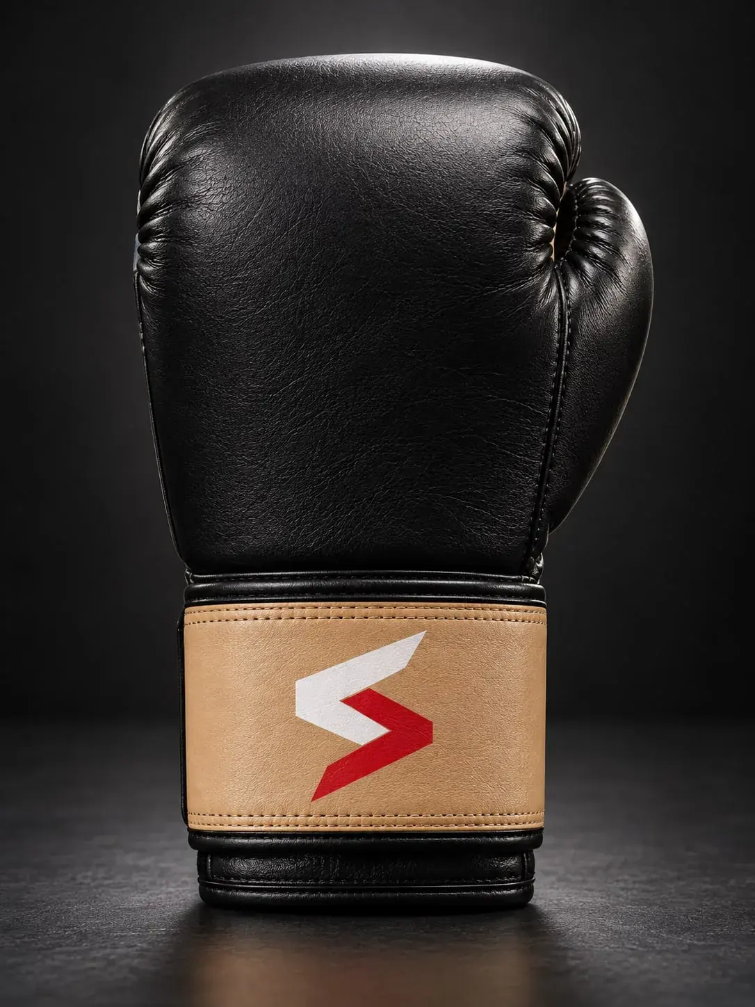 The finished black leather boxing glove with a tan cuff, the Sparwright logo heat-transferred onto the cuff as in the mockup.