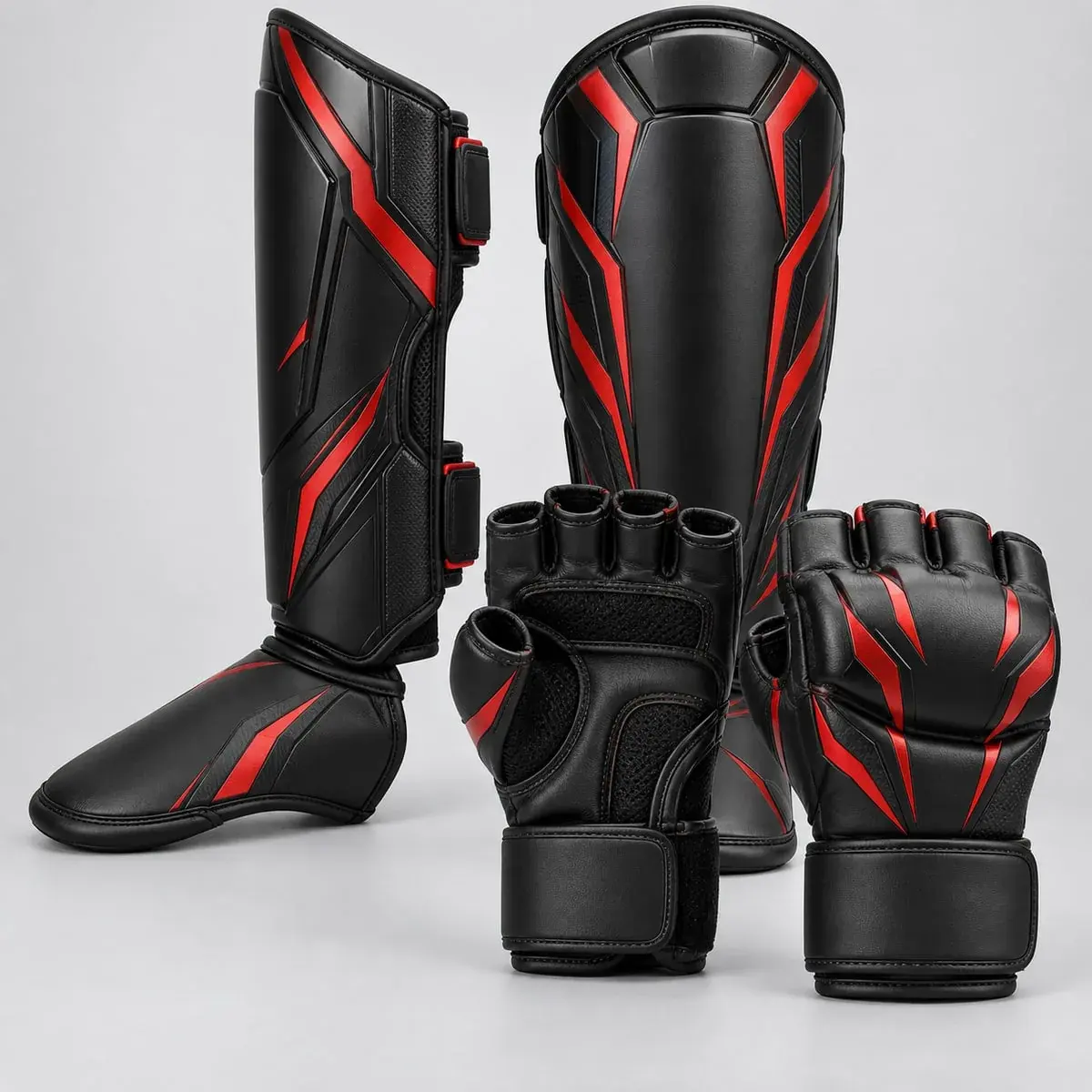 Black MMA gloves and shin guards with red angular graphics.